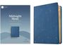 "Midnight Mom Devotional Bible" steht in weißem Text, abgebildet ist eine blaue Bibel mit kleinen, kreuzförmigen Goldakzenten.