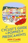 Text: "A Cyclist's Guide to Poppies & Predicaments", Ann Claire. Illustration: Zwei Fahrräder vor bunten Häusern am Wasser.