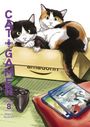 Links senkrecht: "Cat + Gamer", "Volume 8". Zwei Katzen in einer Kiste, ein Gamecontroller und Spielehüllen sind sichtbar.