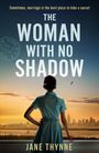 Text: "The Woman With No Shadow." Eine Frau in einem blauen Kleid blickt auf eine Skyline bei Sonnenuntergang.