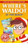 "WHERE'S WALDO? AT THE BEACH" in großen, weißen Buchstaben. Illustration: lächelnde Figur mit Brille und roter Mütze.