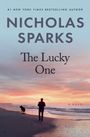 Text: "Nicholas Sparks, The Lucky One, A Novel." Silhouette von Mann und Hund am Strand bei Sonnenuntergang.