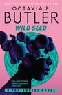"New York Times Bestseller", "Octavia E. Butler", "Wild Seed", Zitat von Viola Davis, "A Patternist Novel". Illustration: abstrakte Köpfe mit Kugeln.