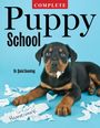 "COMPLETE Puppy School", Dr. Quixi Sonntag. Ein Welpe sitzt auf zerrissenem Papier mit "Homework".