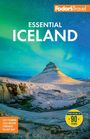 "Essential Iceland" vor einer schneebedeckten Landschaft mit Wasserfall und Berg unter Polarlichtern. Logo oben rechts.