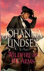 Titel: "Wildfire in His Arms" von Johanna Lindsey. Ein Cowboy hebt den Hut, im Hintergrund ein Sonnenuntergang.
