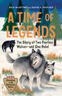 "A Time of Legends" und "The Story of Two Fearless Wolves—and One Rebel". Drei Wölfe im Schnee, Tannen im Hintergrund.