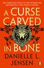 Danielle L. Jensen: A Curse Carved in Bone, Buch