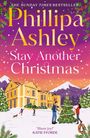 Buchtitel: "Phillipa Ashley, Stay Another Christmas". Ein festlich geschmücktes Haus mit Schneefall und Menschen beim Weihnachtsbaum.