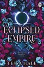 Titel: Eclipsed Empire. Text: Wolves of Crescent Creek. Autor: Tessa Hale. Illustration mit Blumen und Wolfskopf.