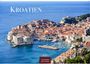 KROATIEN. 2027. CASARES EDITION. Ansicht von Dubrovnik mit roten Dächern, blauen Meer und antiken Stadtmauern.