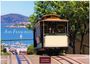 "San Francisco", "2027", "CASARES EDITION" sind sichtbar. Eine Straßenbahn fährt einen Hügel hinunter, im Hintergrund Wasser und Insel.