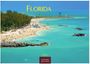 Text: "Florida", "2027", "Casares Edition."  
Szenerie: Strand mit Menschen, blaues Meer, Bäume im Hintergrund.