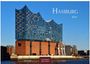 Text: "HAMBURG 2027", "CASARES EDITION". Ein modernes Gebäude mit geschwungener Glasfassade und rotem Backsteinsockel.