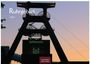 Text: "Ruhrgebiet 2027", "Zollverein", "CASARES EDITION". 
Ein Förderturm bei Sonnenuntergang, Industrieästhetik.
