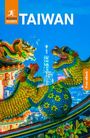 Text: "ROUGH GUIDES TAIWAN," "Free eBook." Zwei bunte Drachen vor einer nächtlichen Skyline mit beleuchtetem Turm.