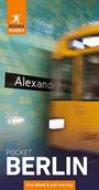 „Alexanderplatz“, „POCKET BERLIN“, „Free eBook & pull-out map“. Verschwommener gelber Zug vor grünen Fliesen.