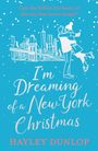 Oben: „Can she follow her heart...?“ Unten: „I'm Dreaming of a New York Christmas“, darunter „HAYLEY DUNLOP“. Illustration: Paar tanzt vor Skyline.