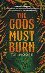 Text: "A true masterpiece." THE GODS MUST BURN, T.R. MOORE. Illustration von Bäumen und einem Wolf im Hintergrund.
