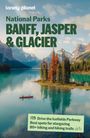 "National Parks Banff, Jasper & Glacier. Drive the Icefields Parkway. Landschaft mit Bergen, See, Bäumen und Kanu."