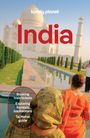 "India" in großen roten Buchstaben, Text: "Booking train tickets, Exploring Kerala's backwaters, Taj Mahal guide." Im Hintergrund der Taj Mahal, zwei Frauen in Saris.