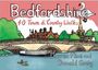 Text: "Bedfordshire - 40 Town & Country Walks. Darren Flint and Donald Greig." Illustrative Darstellung einer Brücke und Landschaft.