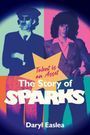 „Talent is an Asset. The Story of SPARKS. Daryl Easlea.“ Zwei Männer in Anzügen, der eine mit Sonnenbrille, der andere mit lockigem Haar.