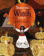 „Seasons of the Witch: Mabon Journal“. Illustration: Frau in Tracht mit Kerzen und Heuballen in herbstlicher Landschaft.