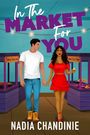 „In The Market For You“ in lila Schrift. Darunter ein Mann und eine Frau, die über einen Markt gehen.