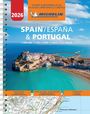 2026, TOURIST & MOTORING ATLAS, SPAIN/ESPAÑA & PORTUGAL. Oben ein blaues Logo, unten eine Küstenstadt.
