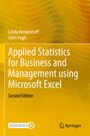 "Applied Statistics for Business and Management using Microsoft Excel, Second Edition." Gelber Hintergrund mit abstrakter Welle.
