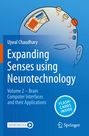 Text: "Ujwal Chaudhary, Expanding Senses using Neurotechnology, Volume 2 – Brain Computer Interfaces and their Applications." Illustration eines Kopfes mit Implantaten auf blauem Hintergrund.