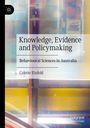 "Knowledge, Evidence and Policymaking" steht zentral, darunter "Behavioural Sciences in Australia" und "Colette Einfeld". Links ein geometrisches Logo. Im Hintergrund abstrakte Farben.