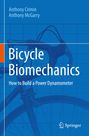 Text oben: Anthony Crimin, Anthony McGarry.  
Text mittig: Bicycle Biomechanics.  
Text unten: How to Build a Power Dynamometer.  
Logo unten: Springer.  
Hintergrund: Fahrradlenker auf blauem Gitter.