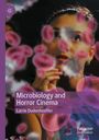 "Microbiology and Horror Cinema" von Larrie Dudenhoeffer. Frau schaut gedankenverloren durch rosa Flecken.