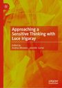 "Approaching a Sensitive Thinking with Luce Irigaray," herausgegeben von Andrea Wheeler und Jennifer Carter. Rot-gelber Hintergrund.