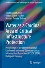 Titel: Water as a Cardinal Area of Critical Infrastructure Protection. Autoren: Tünde Anna Kovács, Róbert Gábor Stadler, Norbert Daruka. Springer-Logo. Farbhintergrund: Bunt, unscharf.