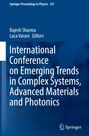 "International Conference on Emerging Trends in Complex Systems, Advanced Materials and Photonics." Blaues Buchcover mit Springer-Logo.