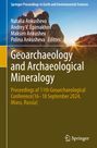 "Geoarchaeology and Archaeological Mineralogy. Tagung Miass, Russland 2024. Feld mit Felsen bei Sonnenuntergang."