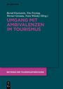 Text: "Umgang mit Ambivalenzen im Tourismus". Blaues Cover, Schrift in Weiß und Lila, unten ein lila Banner.