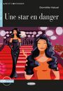 Domitille Hatuel: Une Star en danger. Buch + Audio-online, Buch