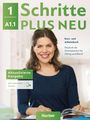 1 A1.1 Schritte PLUS NEU. Kurs- und Arbeitsbuch. Aktualisierte Ausgabe. Eine Frau lächelt und schreibt in ein Buch.