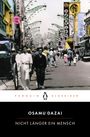 "Osamu Dazai - Nicht länger ein Mensch. Penguin Klassiker." Vintage Straßenszene in Japan mit Menschen und Geschäften.
