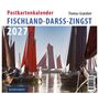 Postkartenkalender Fischland-Darß-Zingst 2027. Geschmückte Segelboote mit roten Segeln auf einem ruhigen Gewässer.
