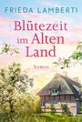„FRIEDA LAMBERTI Blütezeit im Alten Land Roman.“ Ein reetgedecktes Haus, blühende Bäume und ein rosa-blauer Himmel.