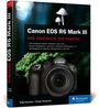 Ein Buchcover mit der Aufschrift "Canon EOS R6 Mark III – Das Handbuch zur Kamera" und einem Foto einer Kamera.