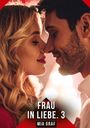 "FRAU IN LIEBE. 3 - MIA GRAF." Zwei Personen kurz vor einem Kuss, mit sanftem Ausdruck, im Hintergrund verschwommene Lichter.
