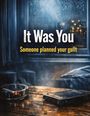 Text: "It Was You. Someone planned your guilt." Szene: Zimmer mit Holztisch, Aschenbecher, brennende Zigarette, Handy, regnerisches Fenster.