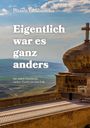 Titel: "Eigentlich war es ganz anders". Untertitel: "Die wahre Geschichte meiner Flucht aus dem Irak". Ein Kreuz auf einem Gebäude.