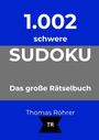 "1.002 schwere Sudoku. Das große Rätselbuch. Thomas Röhrer". Weißer Text auf blauem und grauem Hintergrund.